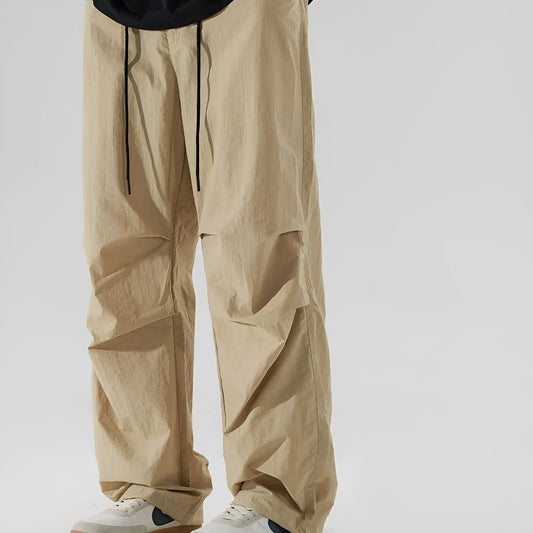 Men's loose straight-leg casual pants in thin ice silk fabric shown in black colour