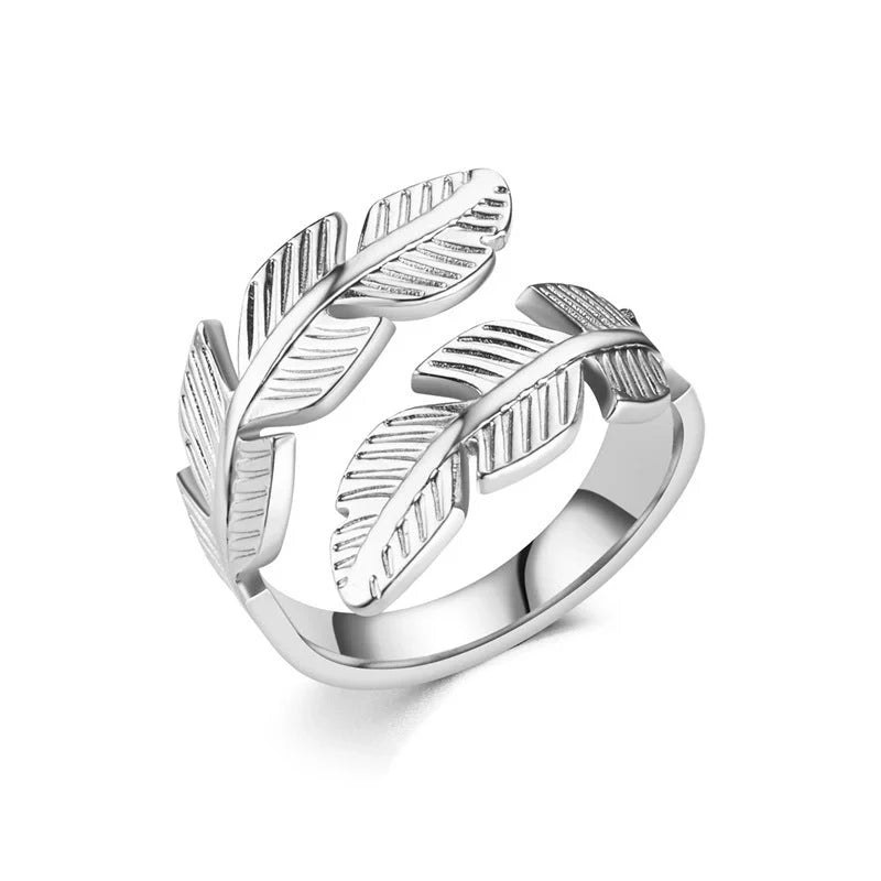 Adjustable feather ring in titanium steel with gold and silver options, featuring a unique handcrafted design.