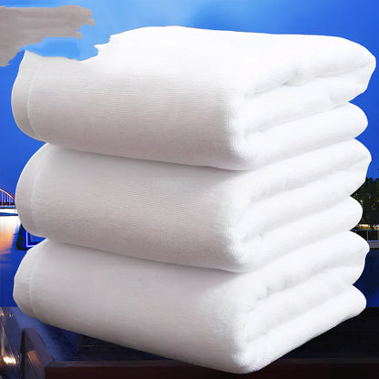 White hotel bath towel with thickened 100% cotton construction showing texture detail