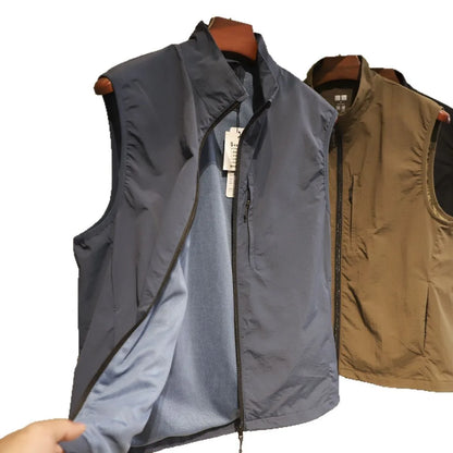 Men's navy blue quick-dry nylon vest cardigan with side pockets on a hanger