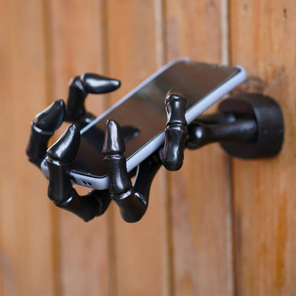 Black skeleton hand wall hook with articulated fingers for hanging keys and jewellery