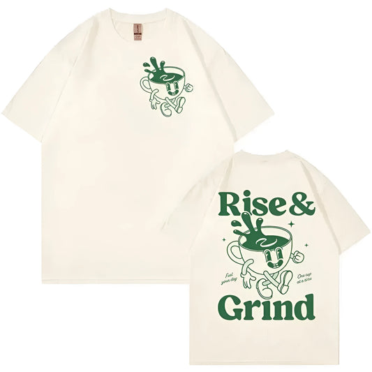 Man wearing a loose linen t-shirt with a printed Rise And Grind Green Coffee cartoon illustration.