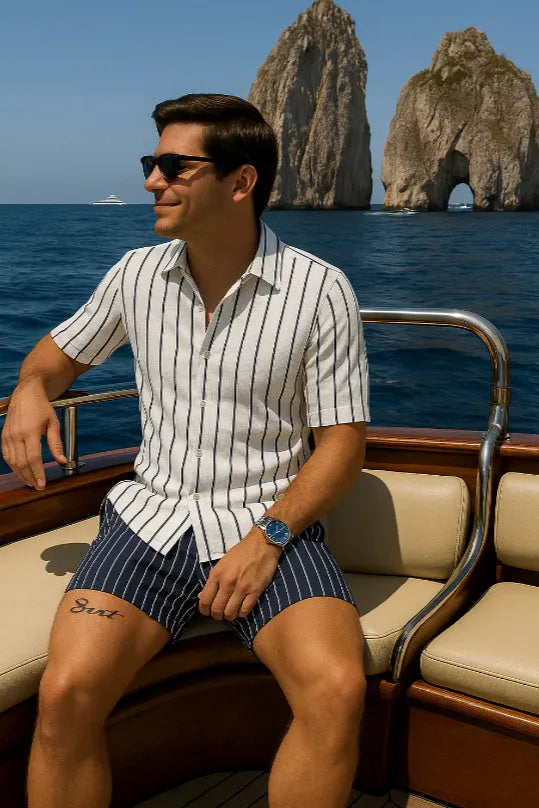 Men's blue beach shirt and shorts set with four-sided elastic fabric on beach background