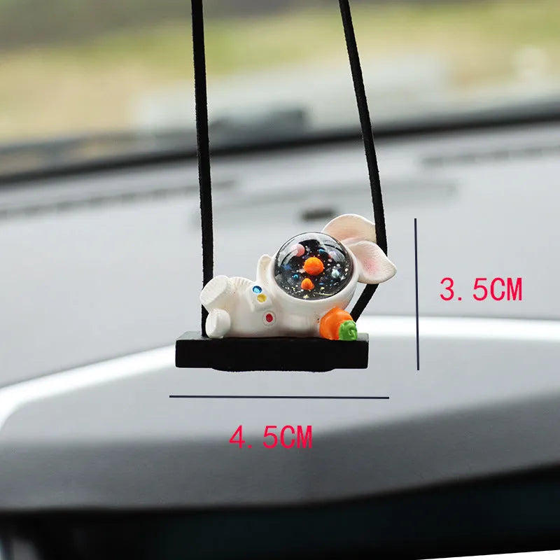 Colourful resin astronaut car pendant ornament with cartoon spaceman design on car dashboard