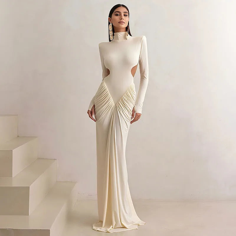 Women's long sleeve high collar slim fit dress with pleated backless design in light apricot colour