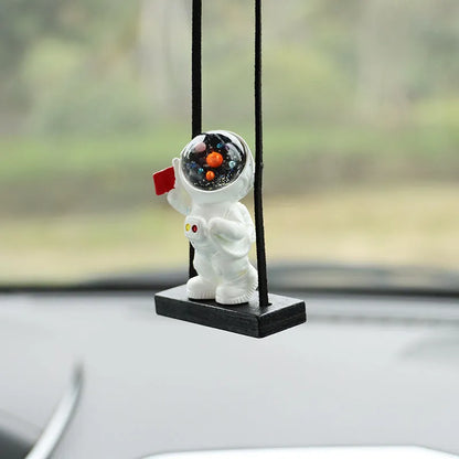 Colourful resin astronaut car pendant ornament with cartoon spaceman design on car dashboard