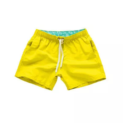 Men's summer surf shorts in various colors, made from 100% polyester for quick drying and durability