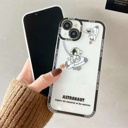 Transparent silicone iPhone case with blue astronaut print, shown on a phone.