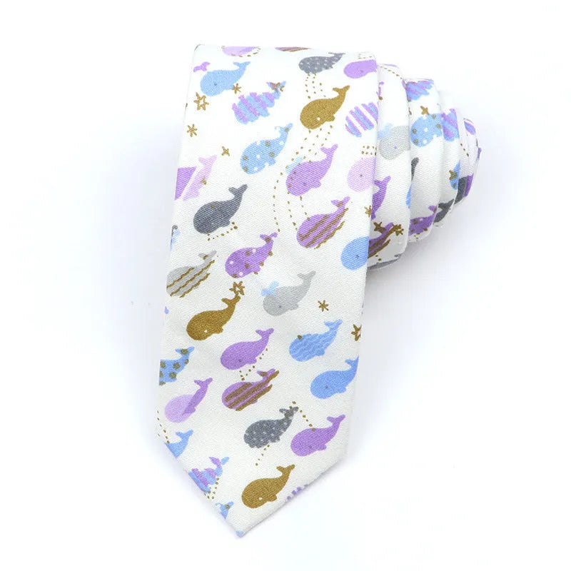 A narrow Korean-style cotton bow tie featuring a cartoon print, shown in a selection of colours.