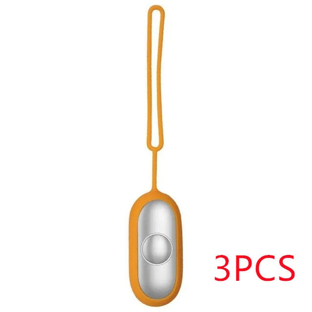 Hand-held micro-current sleep aid device in grey, green, and orange colour options
