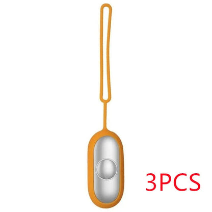 Hand-held micro-current sleep aid device in grey, green, and orange colour options