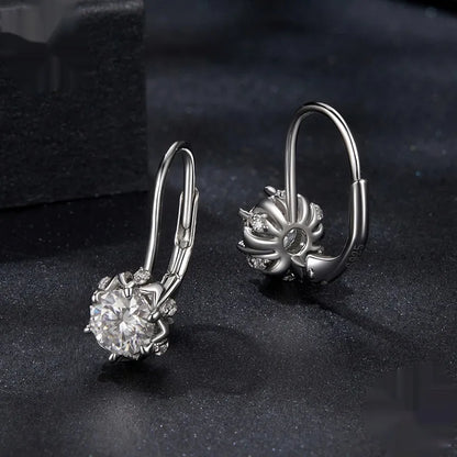 Sterling silver flower bud ear clips with white gold plating and moissanite centre stone