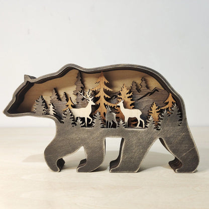 Handcrafted wooden elk and brown bear Christmas decorations with forest theme