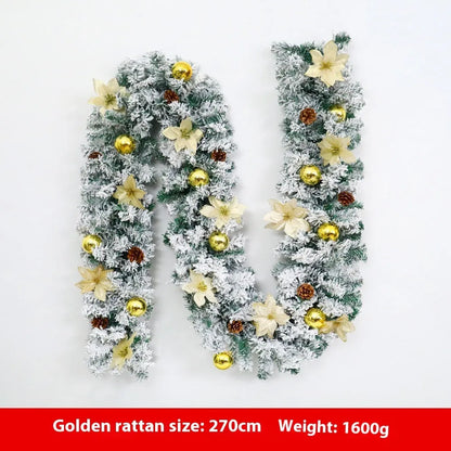 PVC Christmas rattan garland with flocked decoration in golden colour, draped as a festive vine.