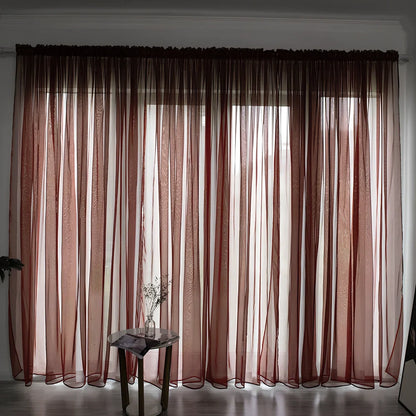 Simple modern balcony solid colour gauze curtain in beige showing light transmission effect