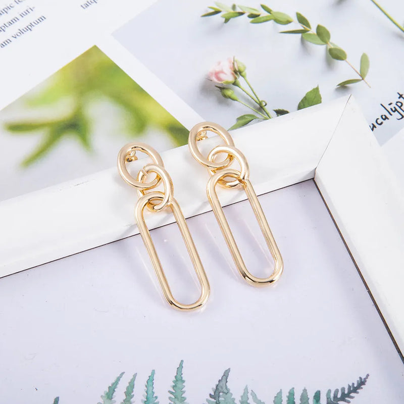 Sterling silver needle hoop earrings for women featuring alloy construction with electroplated finish in geometric ring and line design, suitable for everyday wear and formal occasions