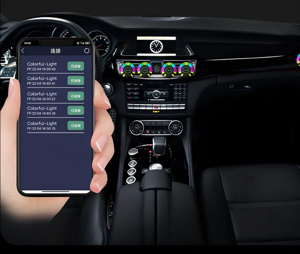 Car aromatherapy RGB light with 24 LEDs showing colour-changing patterns on vehicle air vent