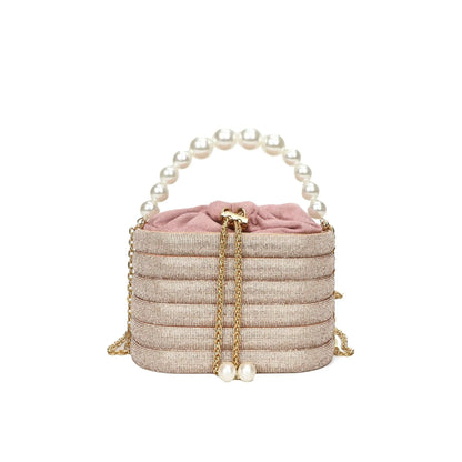 Women's soft PU crossbody bag with beaded accents, round shape, and single shoulder strap in black colour.