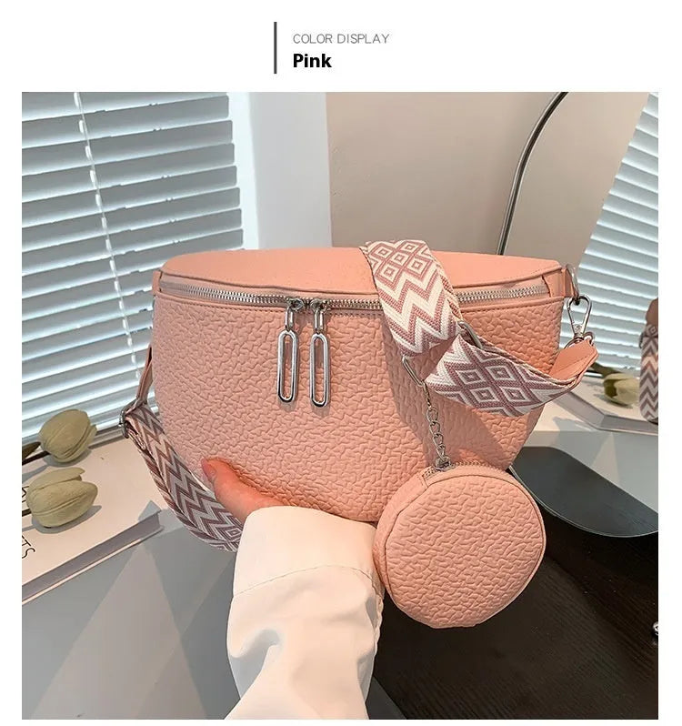 Women's solid colour PU crossbody bag with saddle lock zipper texture in clamshell design