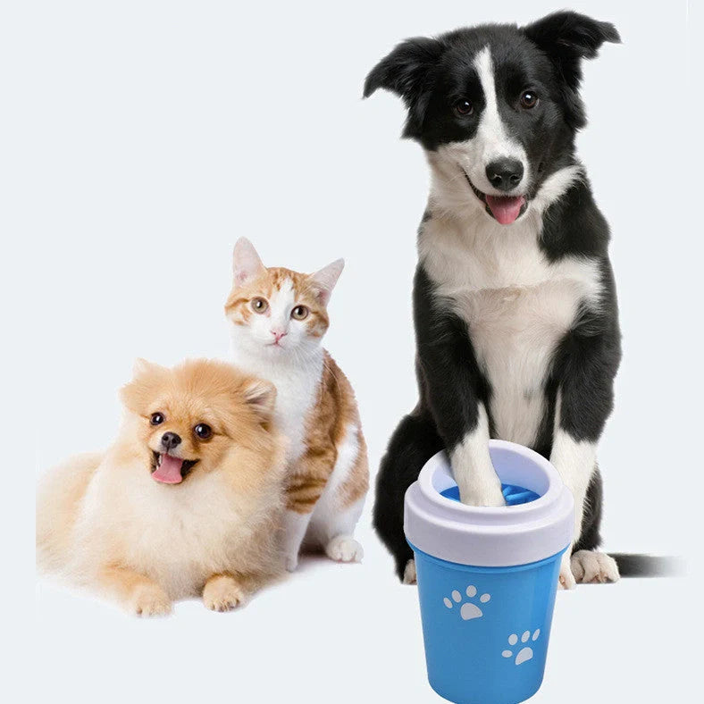 Silicone dog paw cleaner cup in blue, green, or pink with soft bristles for washing muddy paws