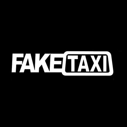 Waterproof FAKE TAXI car sticker in black, 20cm by 8cm, on a vehicle window.