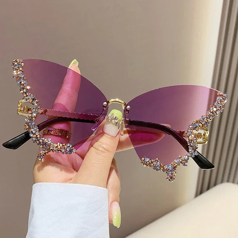 Luxurious diamond-studded butterfly sunglasses with oversized frames and a variety of color options