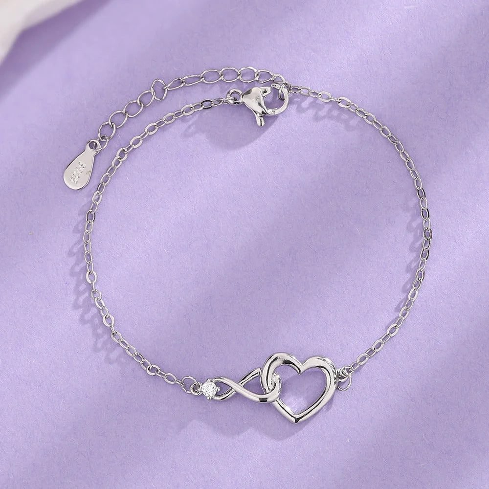 Heart-shaped bracelet with 3A zirconia in platinum and golden colors