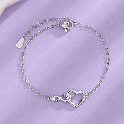 Heart-shaped bracelet with 3A zirconia in platinum and golden colors