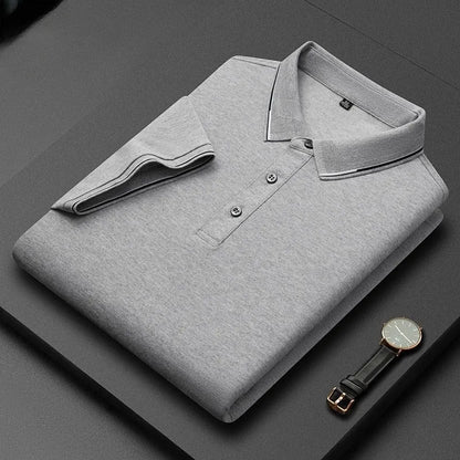 A man's mulberry silk short-sleeved T-shirt in a regular fit, shown in a light colour, highlighting its thin fabric.