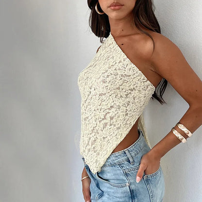 Women's apricot lace backless sleeveless top with asymmetrical neckline on a mannequin