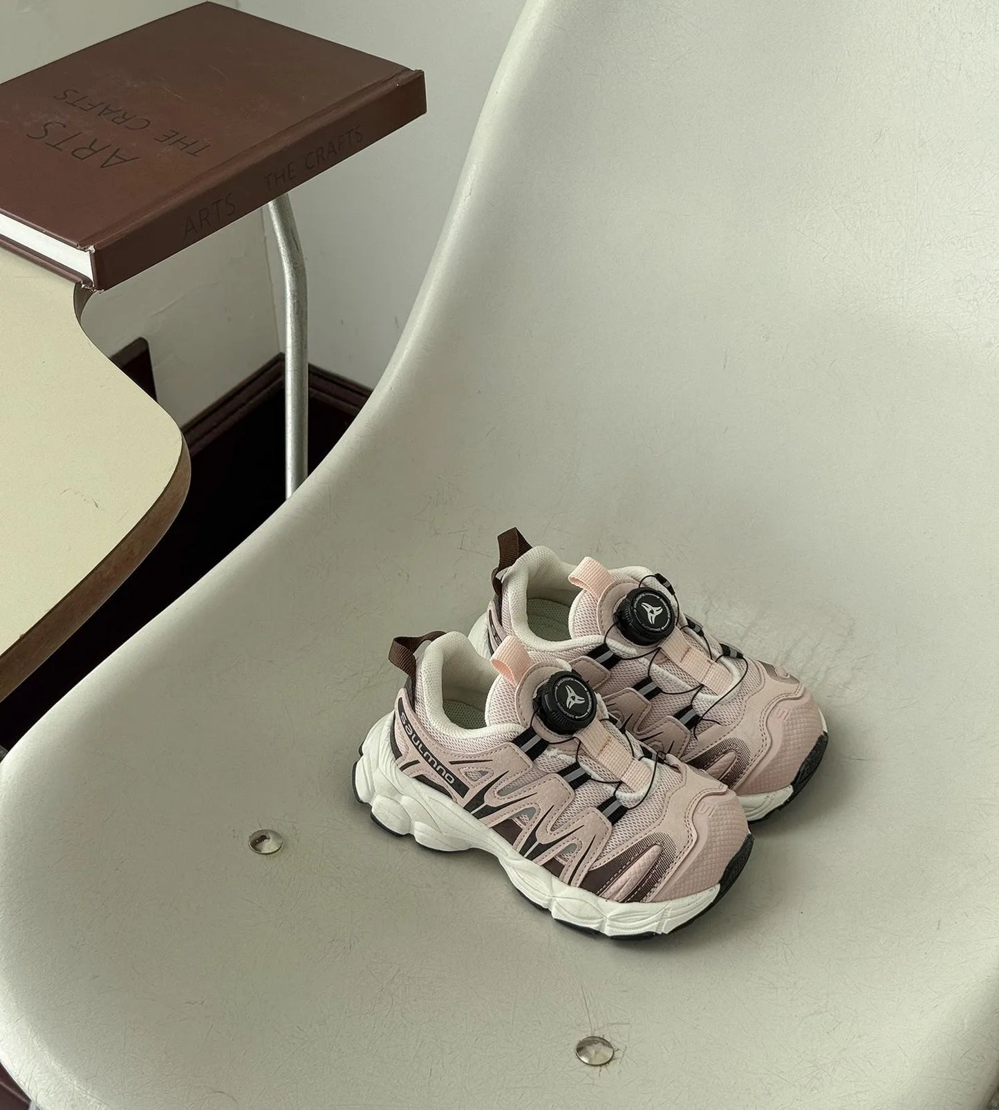Pair of solid-colour casual shoes with a PU leather mesh upper, shown in beige.
