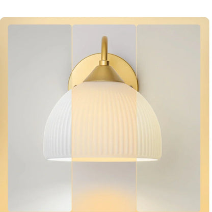Gold and white postmodern glass table lamp with frosted shade on iron base