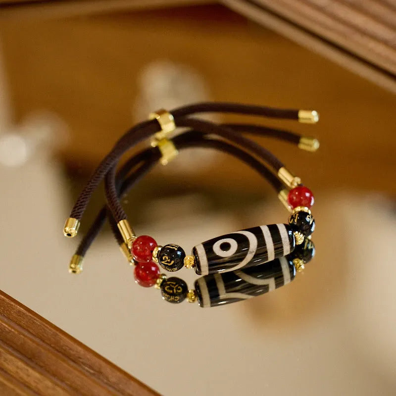 Agate Dzi Bead Bracelet handmade Tibetan ethnic style bracelet with 8mm geometric beads and retro design in unisex size featuring traditional Tibetan agate with nine purple fire pattern and separate carrying strap