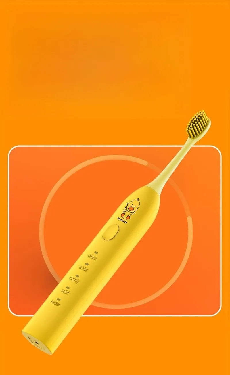 Yellow rechargeable electric toothbrush with small duck design, soft bristles and USB charging cable