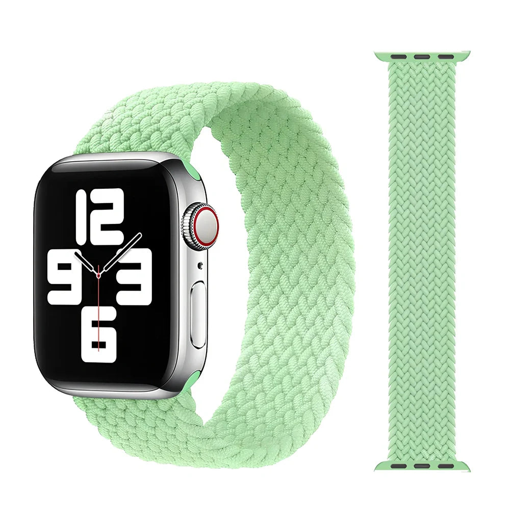 Apple Watch with elastic braided nylon strap in single-loop design showing stretch capability