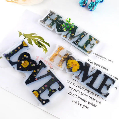 Silicone epoxy mould for resin crafts showing English mirror letters with love word designs in irregular shapes