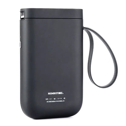 D11 Bluetooth thermal label printer in black, showing compact design and smartphone app connection