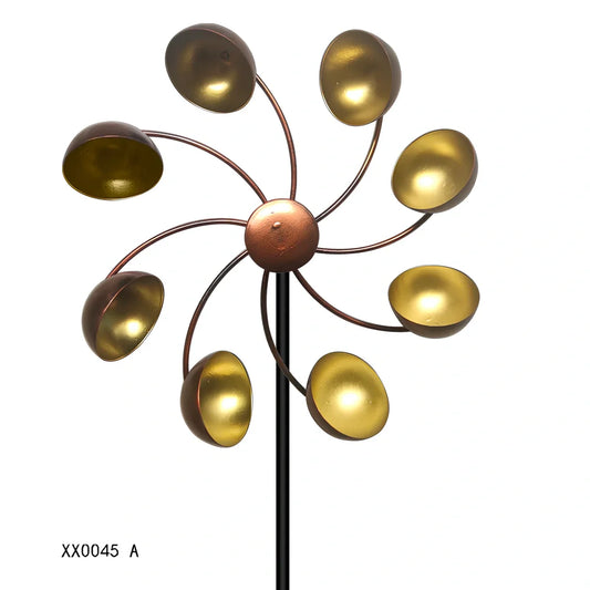 Handmade iron windmill garden ornament with geometric patterns in bronze colours