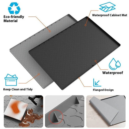 Grey silicone sink mat measuring 864mm by 558mm protecting kitchen cabinet from water damage