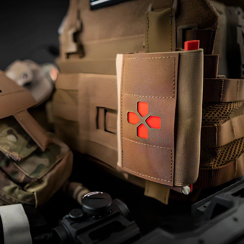 Nylon first-aid kit in camouflage pattern with organised medical supply compartments