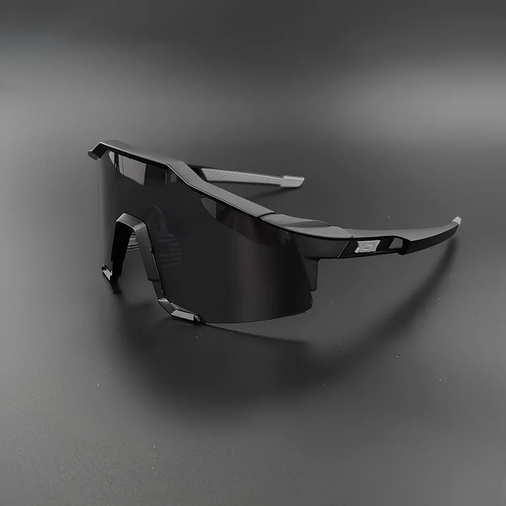Cycling glasses with interchangeable lenses showing UV400 protection and lightweight frame design