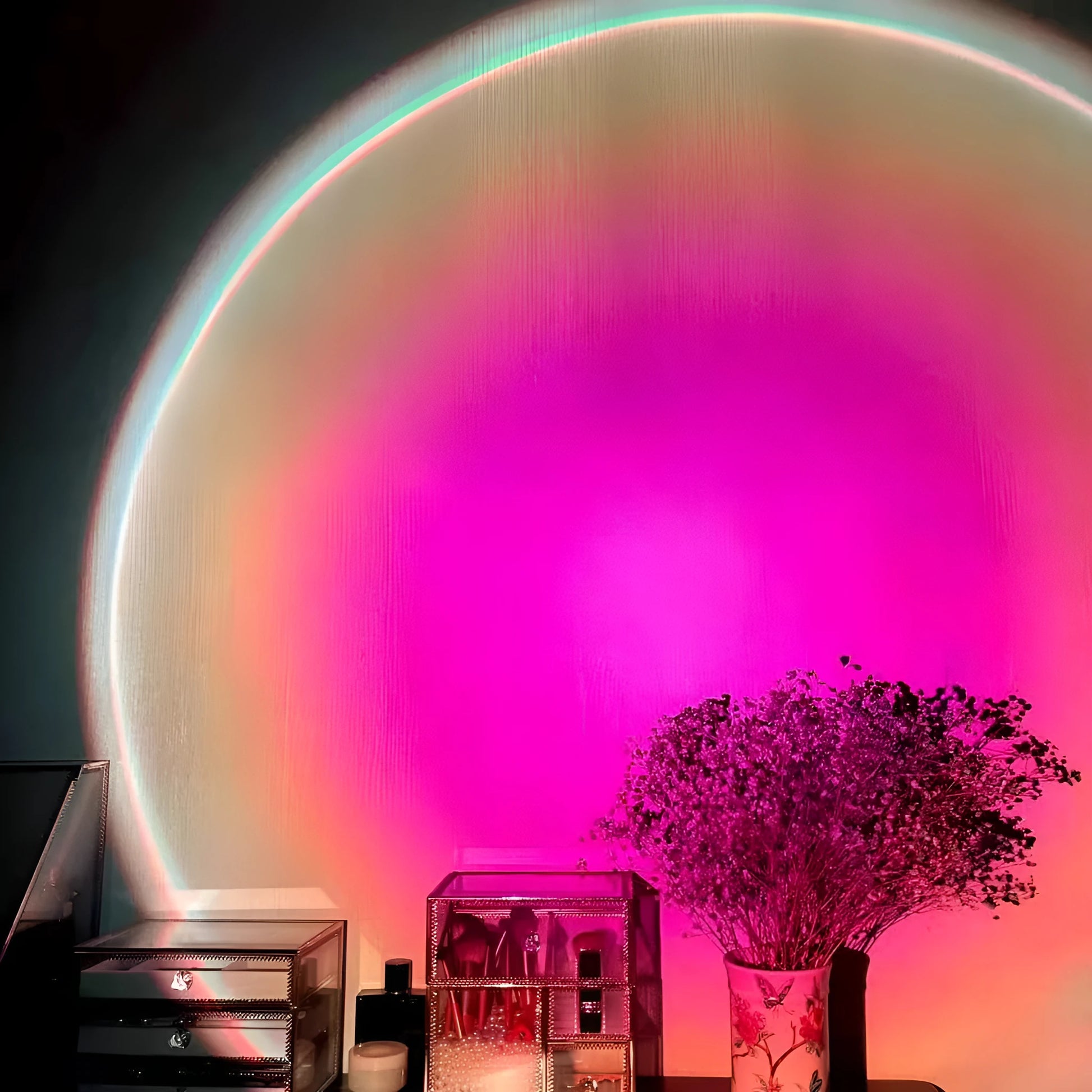 Rechargeable rainbow and sunset projection lamp with USB cable and push-button switch.