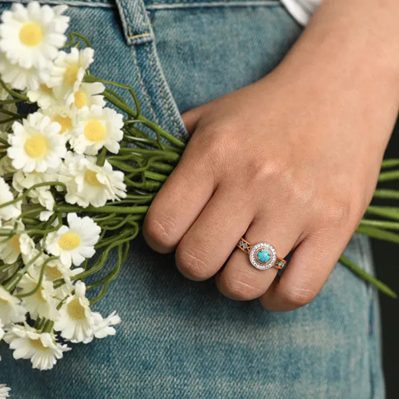 Rose gold turquoise ethnic style ring with geometric design and inlaid zircon detailing