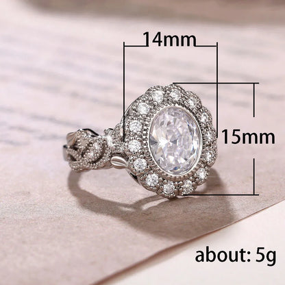 Geometric copper ring with round zircon stone in white gold colour plating.