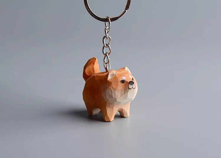 Handmade wooden cat trinkets in gray and orange, perfect for decor or gifts