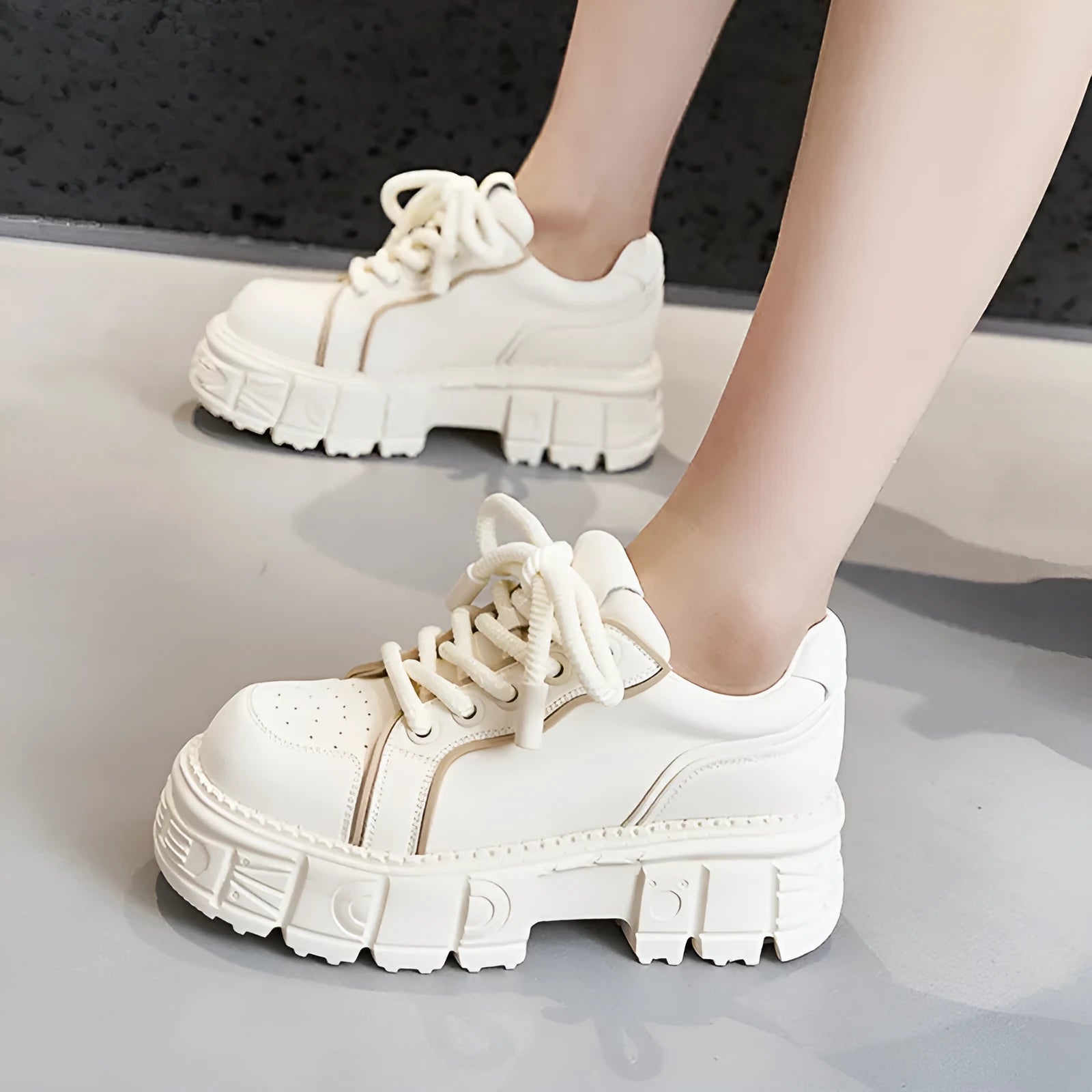 Beige leather muffin bottom shoes with a 4cm wedge sole on a neutral background.
