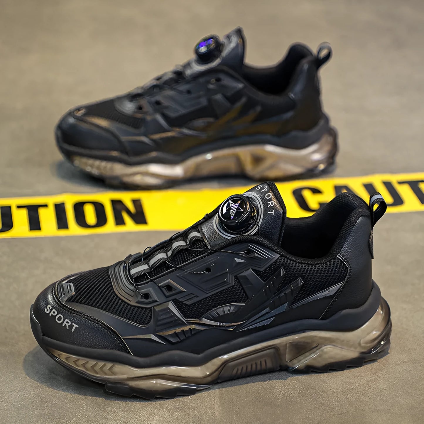 Men's black mesh dad shoes with rotating button detail and a low platform sole