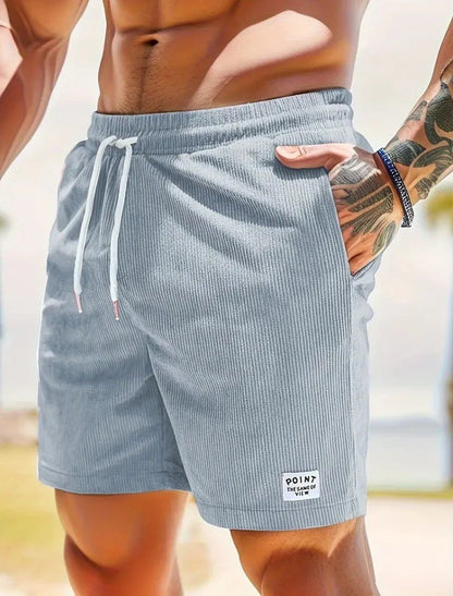 Comfortable corduroy drawstring shorts in a variety of stylish colors, perfect for casual summer wear.