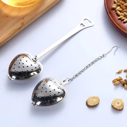Premium stainless steel tea infuser with heart-shaped design, suitable for brewing loose-leaf teas, herbs, and spices