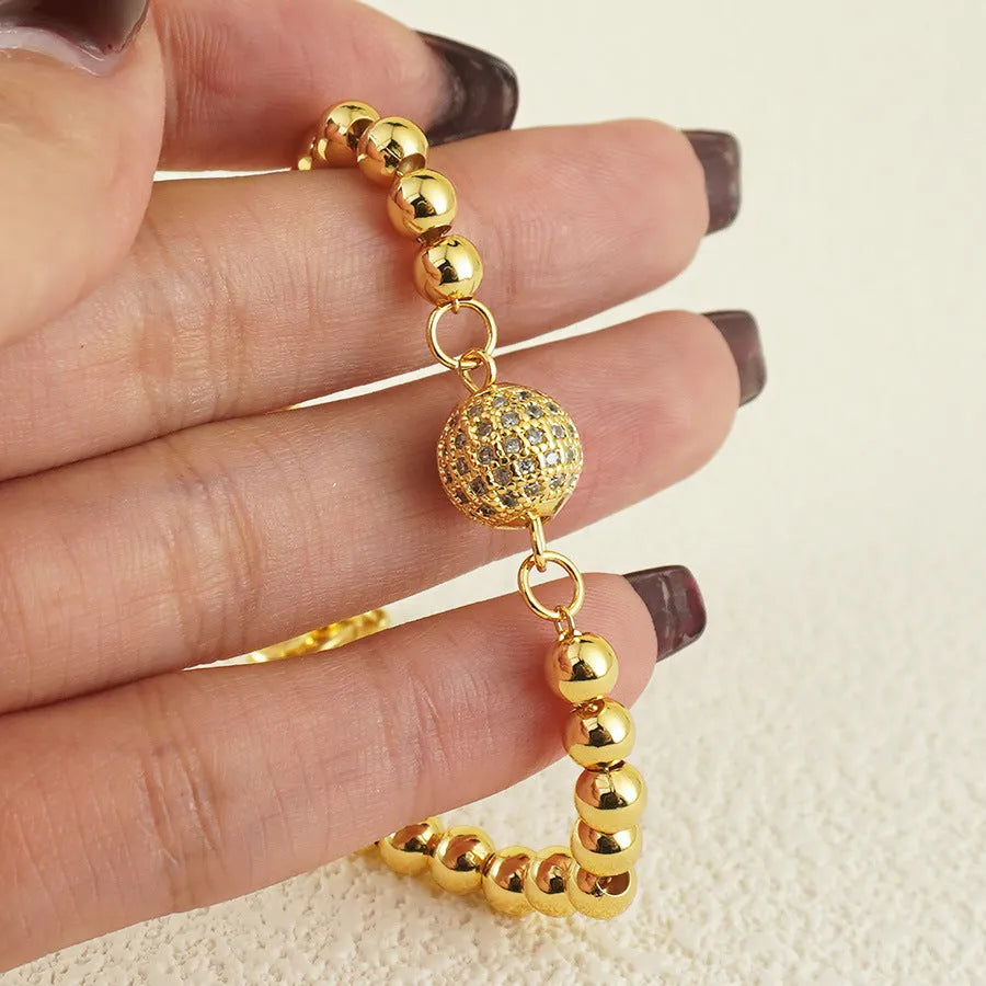 Women's copper bracelet with heart-shaped design and zircon stones, electroplated finish